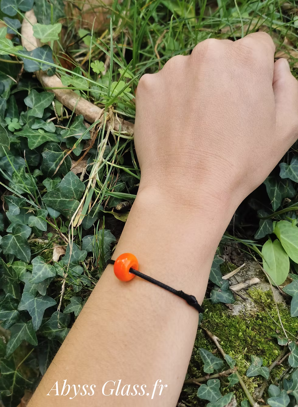 Bracelet avec perle orange en verre de Murano fabriquée à la main